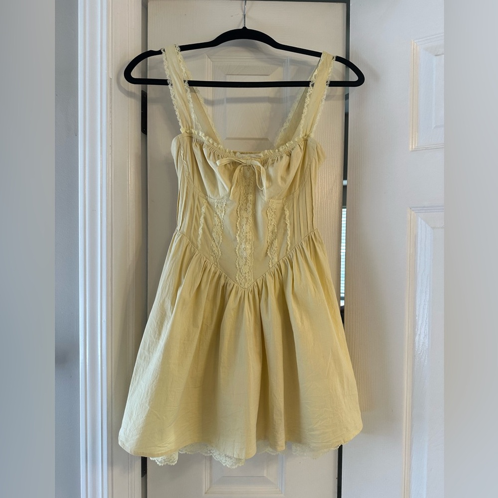 Zia yellow mini dress by more to come